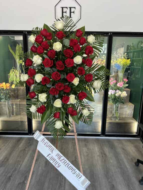 Elegant Red and White Rose Spray - Comforting Tribute