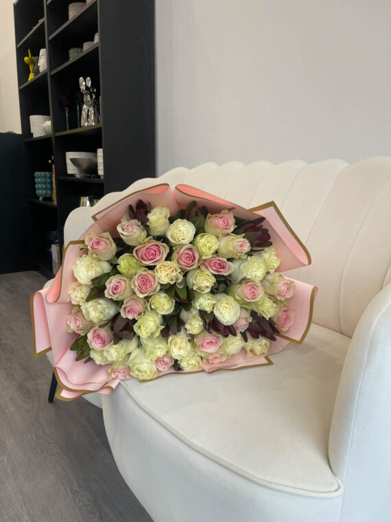 Timeless Grace: Classic Roses with Striking Leucadendron